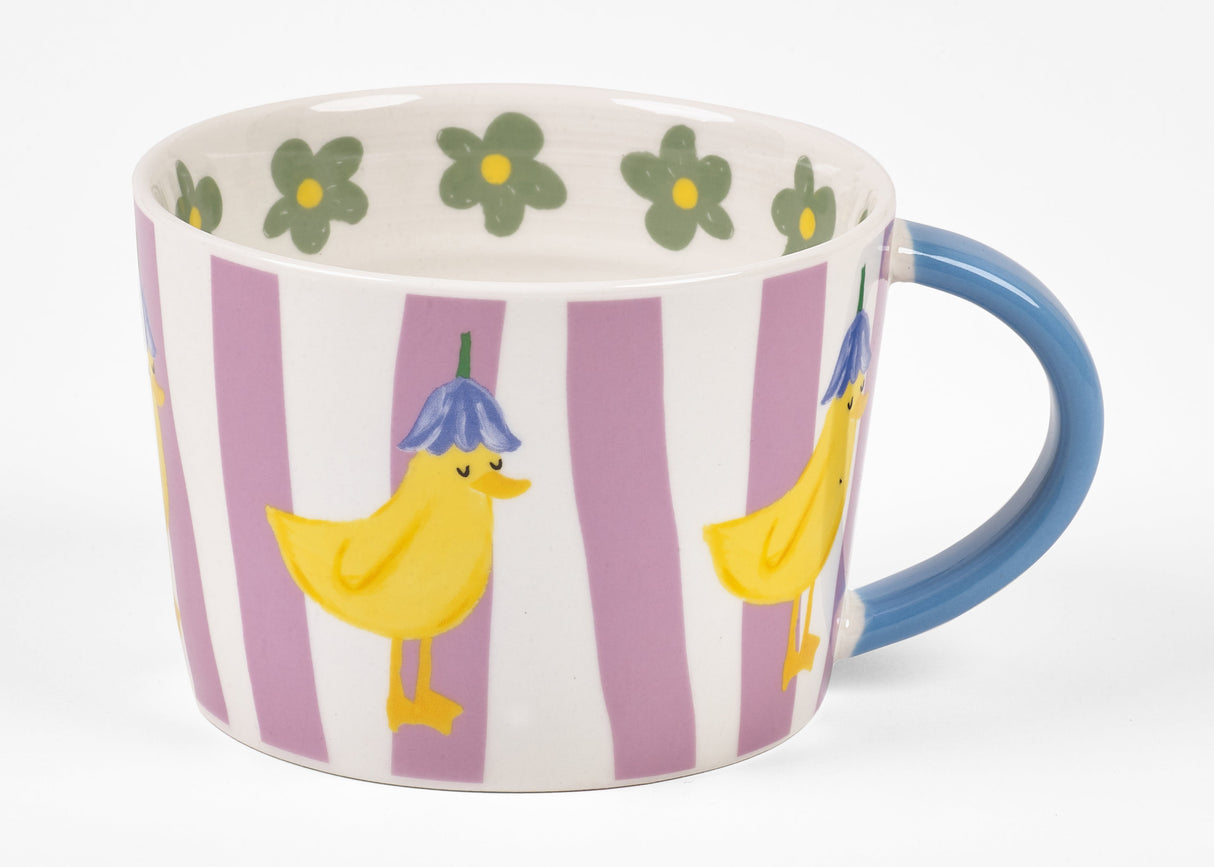 Close-up of duckling illustration on Never Stop Growing mug