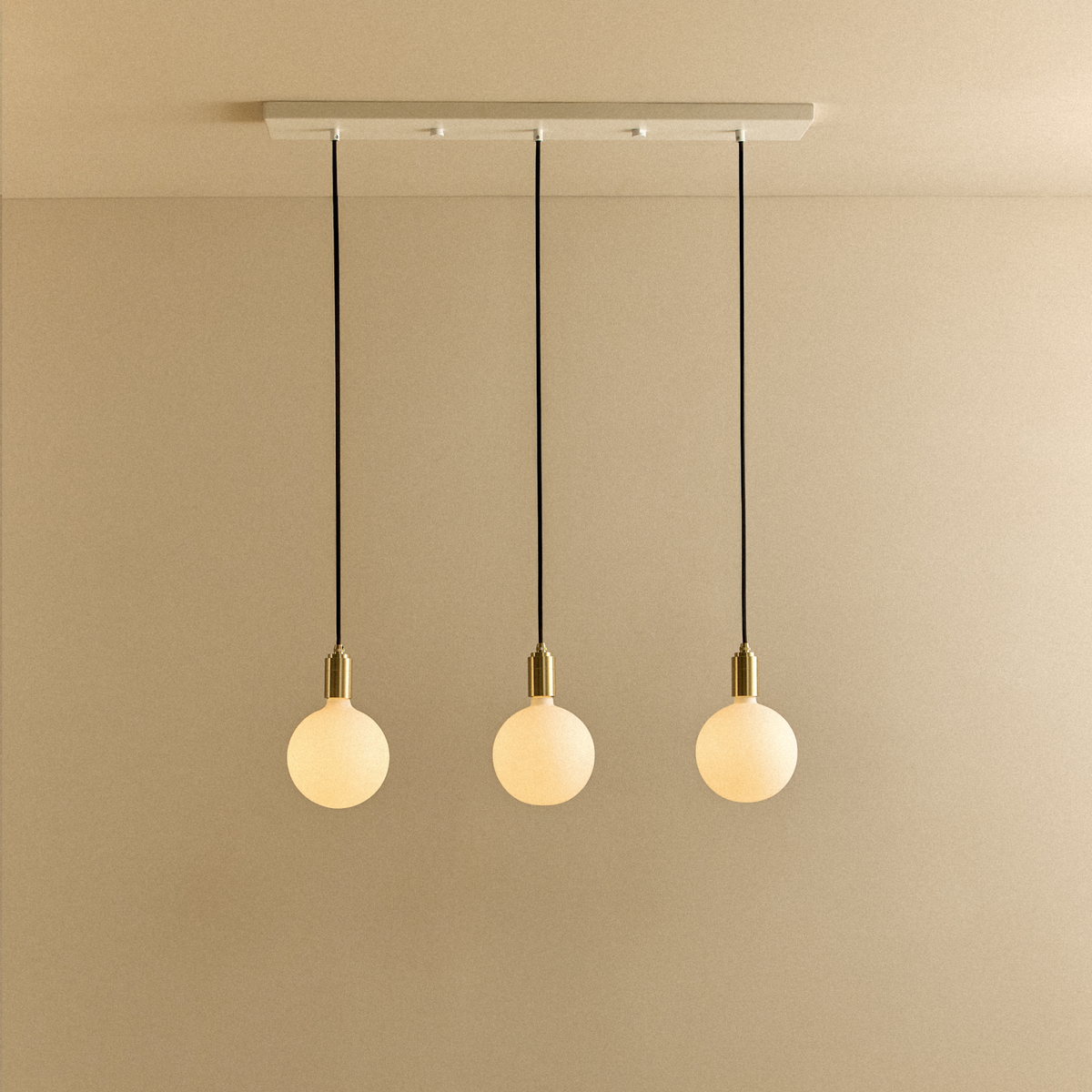 Tala Linear Triple Pendant Light in Brass with Sphere IV