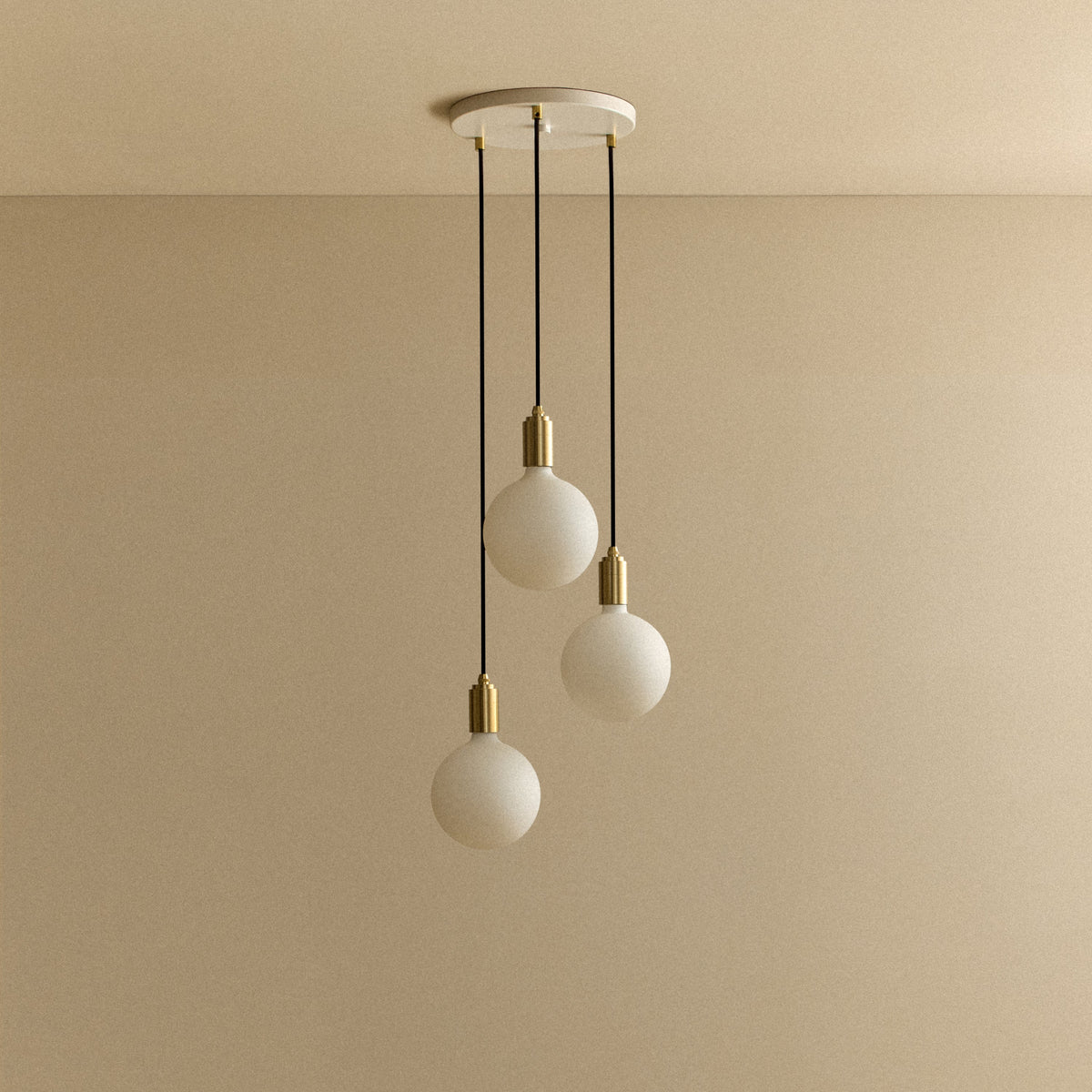 Tala Triple Pendant Light in Brass with Sphere IV Bulbs