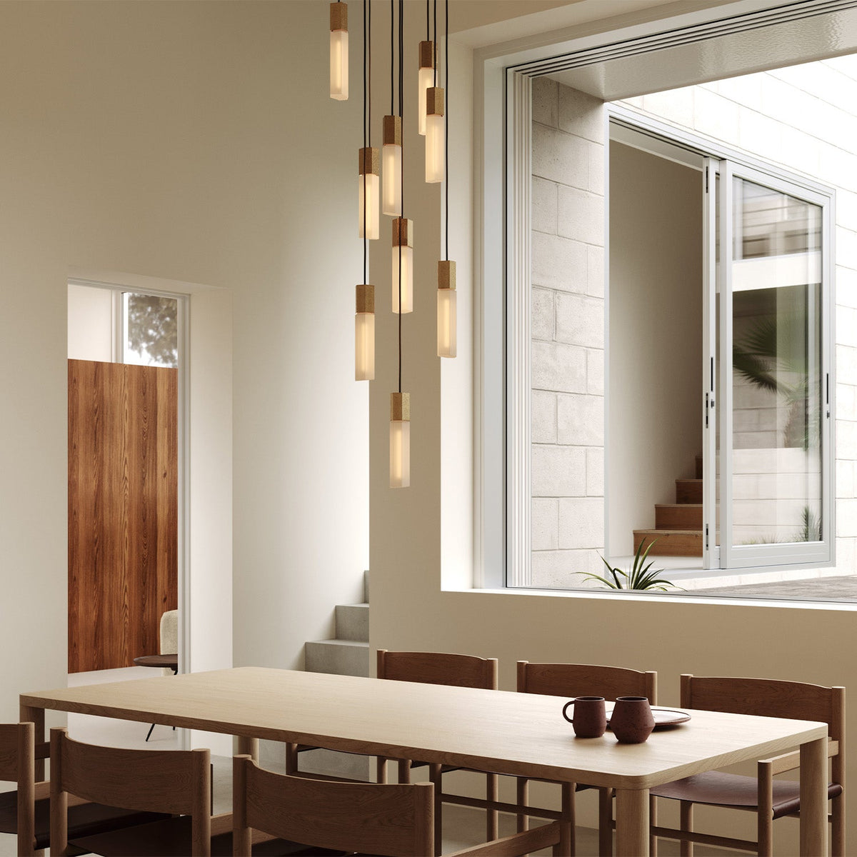 Tala Basalt Nine Pendant Light in Brass