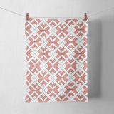 Shadowbright Coral and White Tea Towel with a Geometric Design
