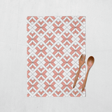 Shadowbright Coral and White Tea Towel with a Geometric Design