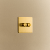 Tala Double Rotary Wall Dimmer in Brass