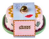 Decorative cake-shaped product with a card on top, featuring the brand 'eleanor bowmer'.