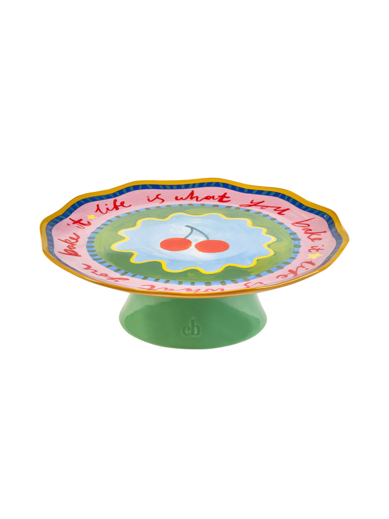 Side view of Eleanor Bowmer cake plate showing raised base and glazed finish