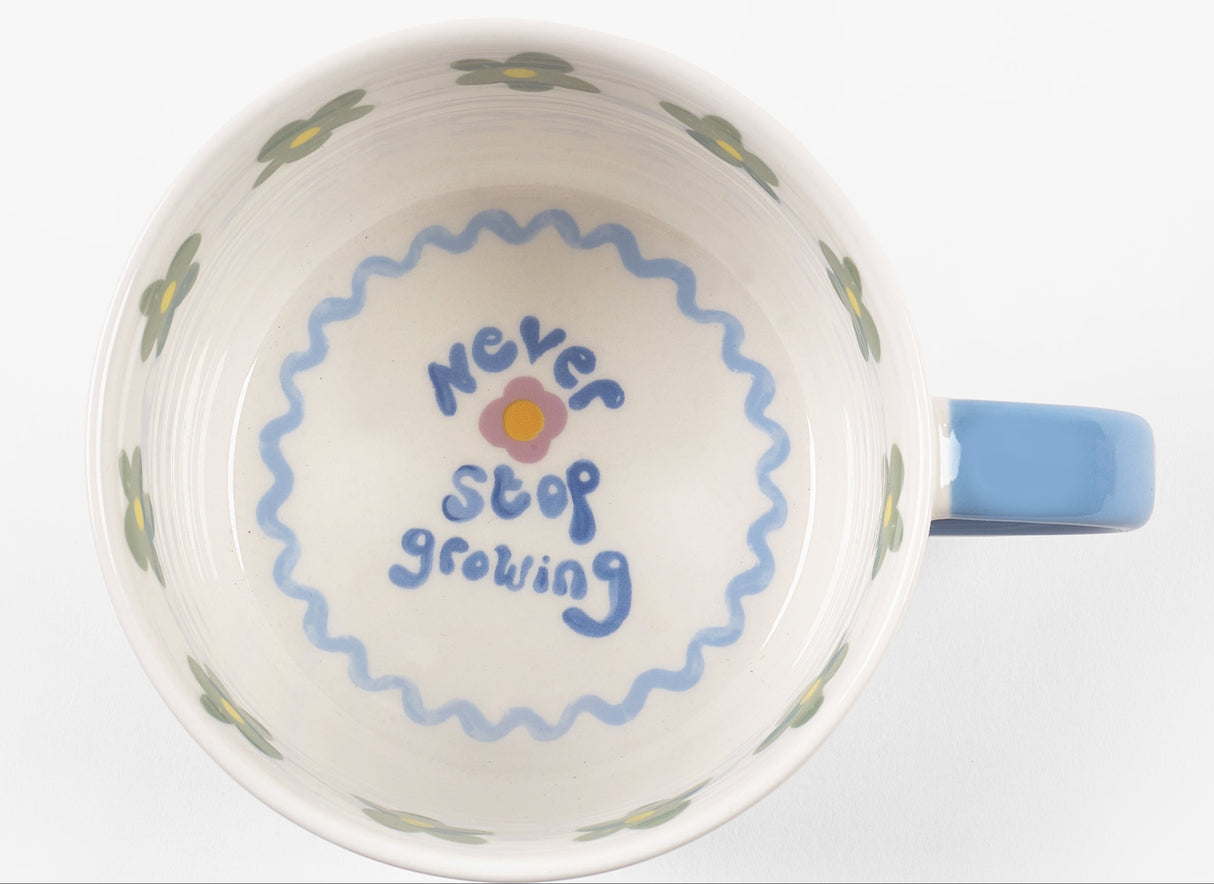 Side view of Eleanor Bowmer Never Stop Growing Duck Mug, 330 ml
