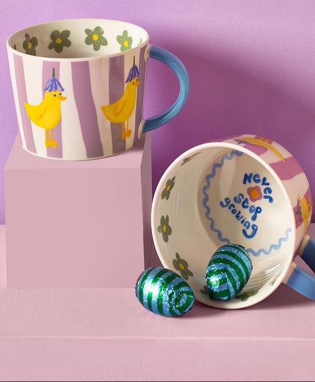 Eleanor Bowmer “Never Stop Growing” Duck Mug with lilac stripes