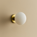 Tala Lochan Wall Light in Brass Oval Dim to Warm