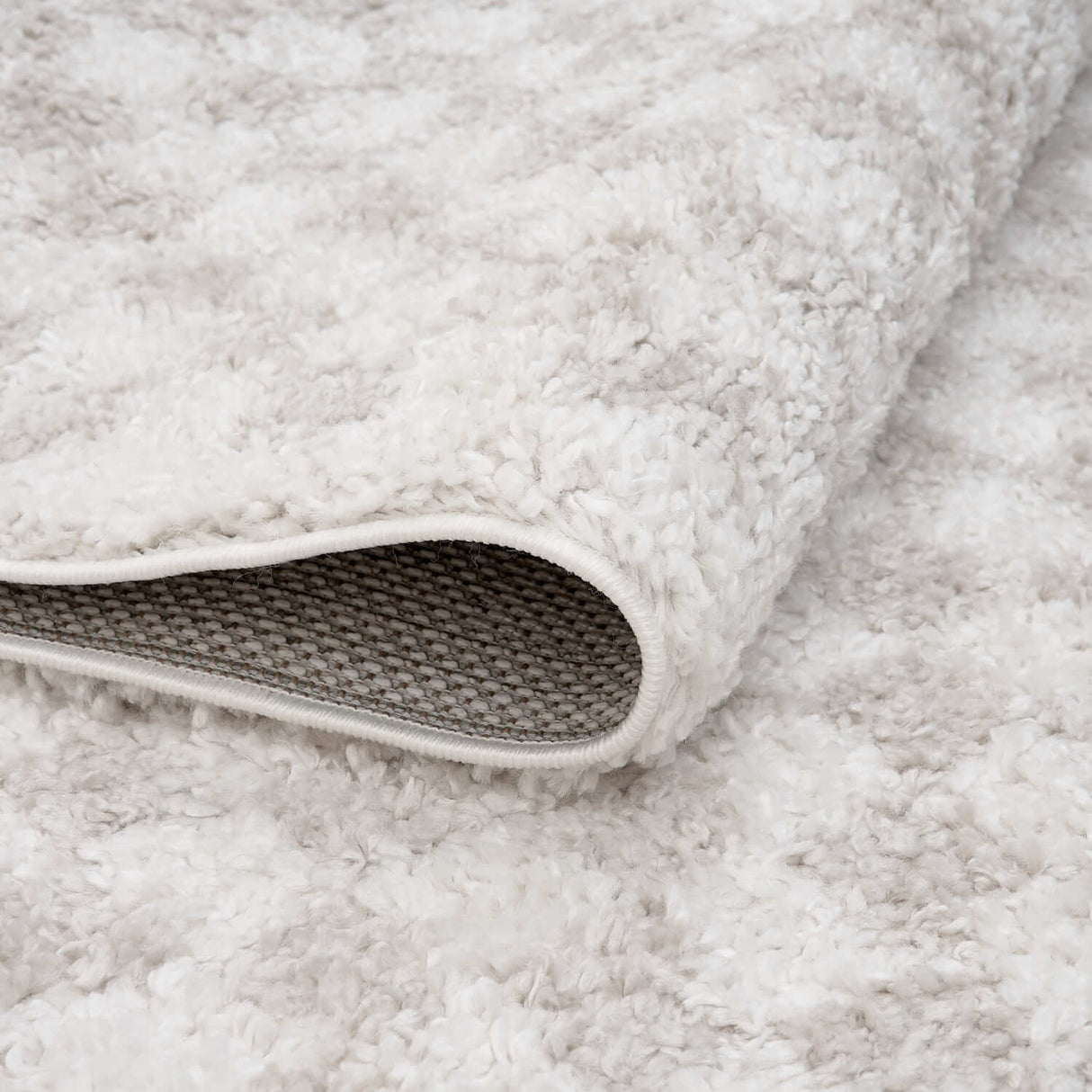 The Rugs Moodi Shaggy Light Beige Nomari Rug