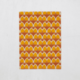 Shadowbright Orange and Yellow Tea Towel with a Geometric Arches Design