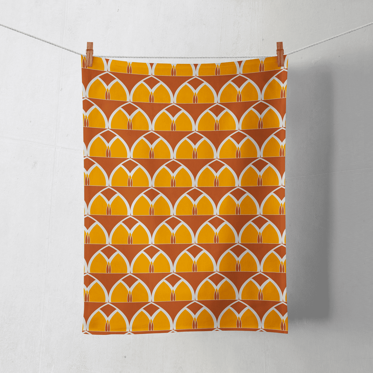 Shadowbright Orange and Yellow Tea Towel with a Geometric Arches Design