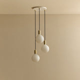 Tala Triple Pendant Light in Brass with Sphere IV Bulbs