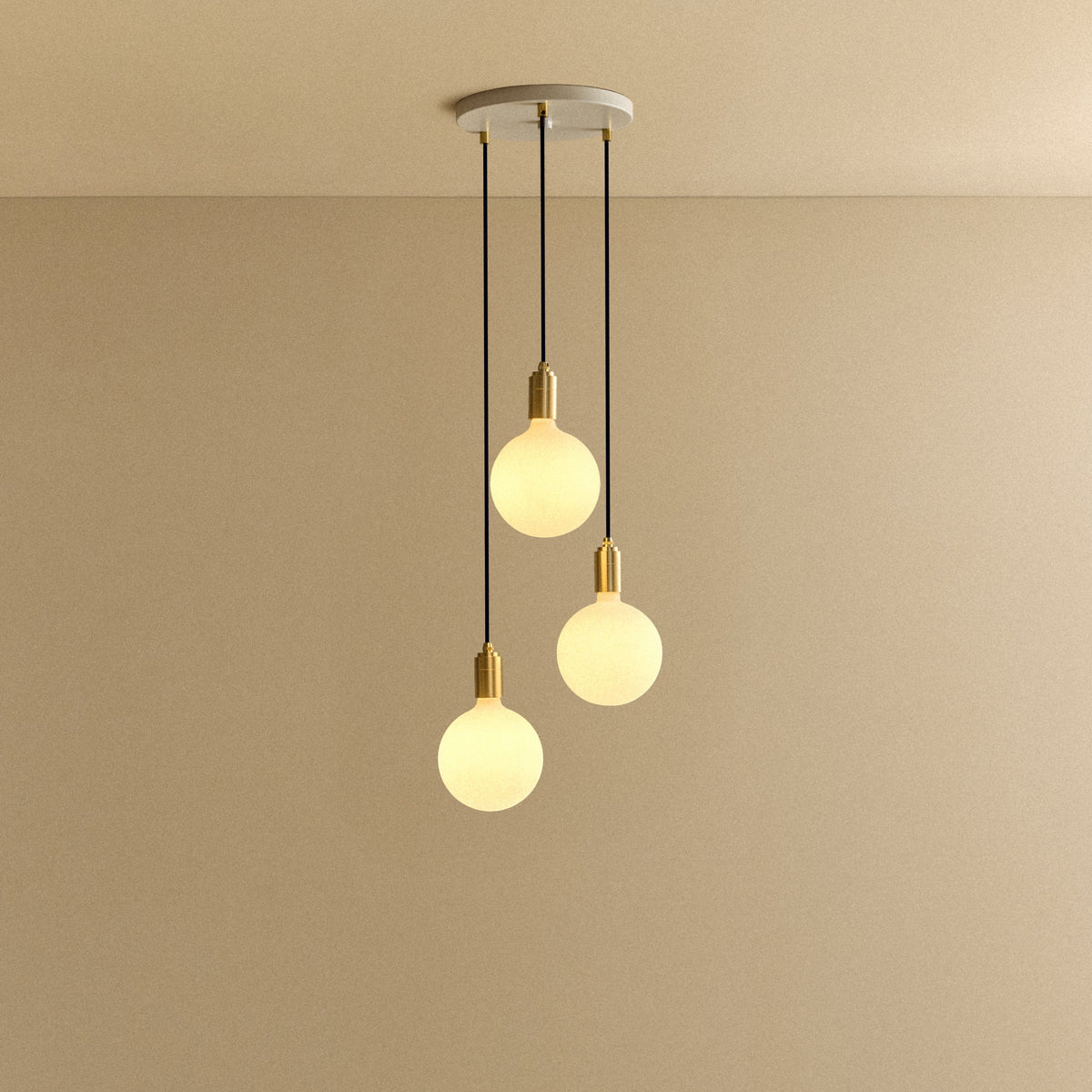 Tala Triple Pendant Light in Brass with Sphere IV Bulbs