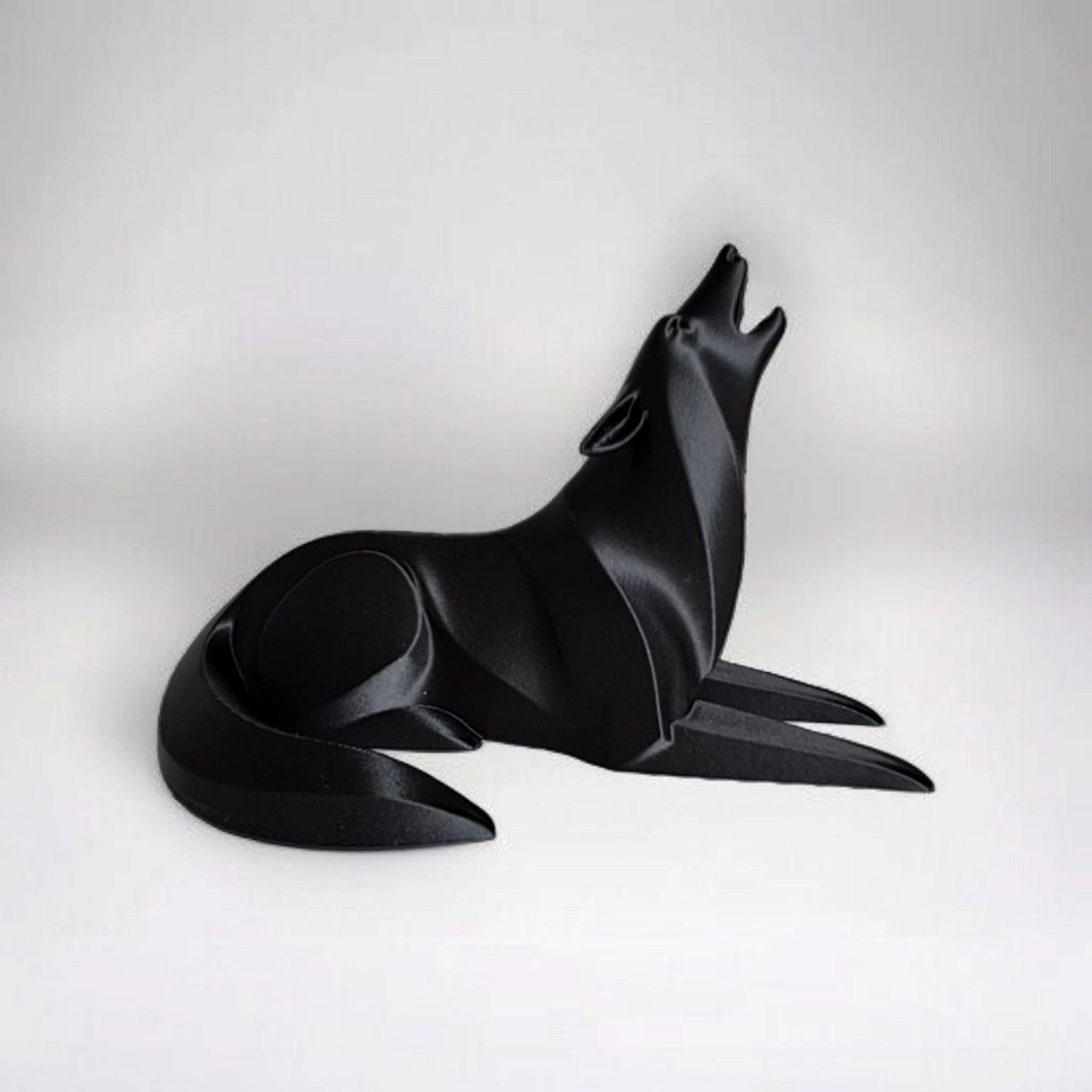 Filamora Studios Minimalist Lying Wolf Sculpture