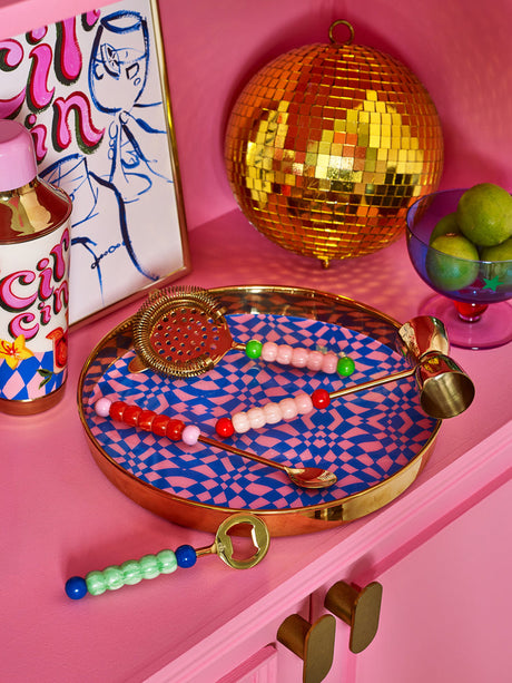 Cocktail accessory set on home bar surface