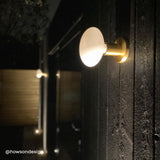 Tala Lochan Wall Light in Brass Oval Dim to Warm