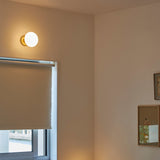 Tala Lochan Wall Light in Brass Oval Dim to Warm